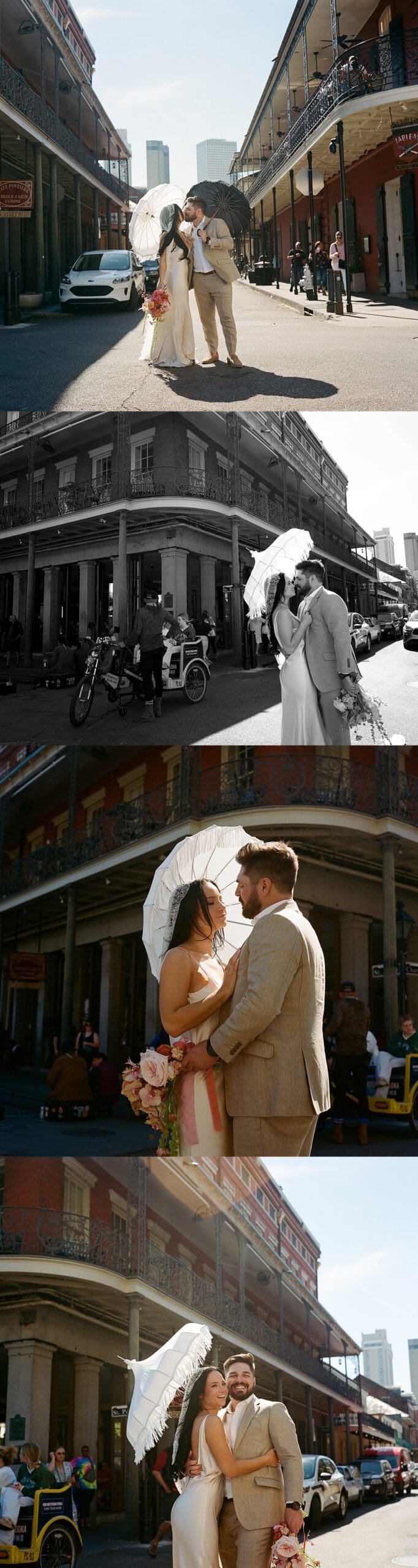 Bride and groom kiss under a parisol on the street by New Orleans wedding photographer